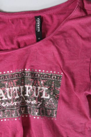 Γυναικείο t-shirt Colours Of The World, Μέγεθος XS, Χρώμα Ρόζ , Τιμή 5,00 €