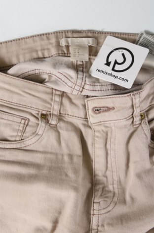 Damskie jeansy H&M, Rozmiar M, Kolor Beżowy, Cena 66,67 zł