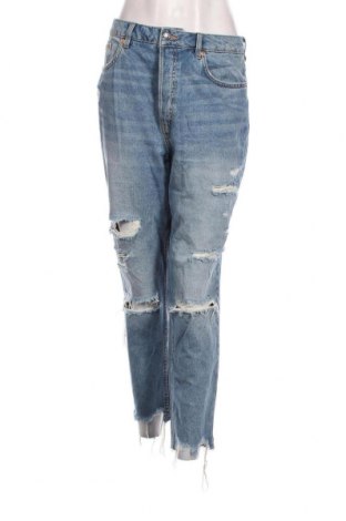 Damskie jeansy H&M Divided, Rozmiar L, Kolor Niebieski, Cena 38,01 zł