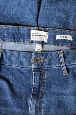 Damskie jeansy River Island, Rozmiar XL, Kolor Niebieski, Cena 109,07 zł