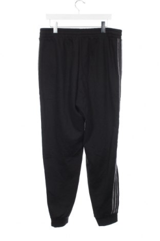 Γυναικείο αθλητικό παντελόνι Adidas, Μέγεθος XL, Χρώμα Μαύρο, Τιμή 21,57 €