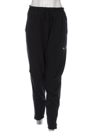 Damen Sporthose Nike, Größe L, Farbe Schwarz, Preis 28,76 €