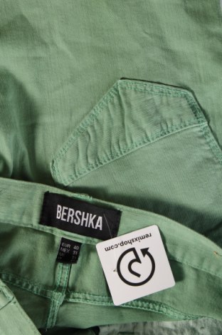 Męskie jeansy Bershka, Rozmiar L, Kolor Zielony, Cena 51,02 zł