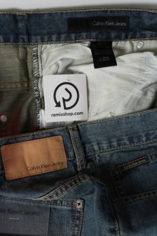 Męskie jeansy Calvin Klein, Rozmiar XL, Kolor Niebieski, Cena 269,16 zł