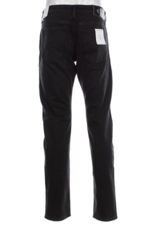 Męskie jeansy Calvin Klein Jeans, Rozmiar L, Kolor Czarny, Cena 323,99 zł