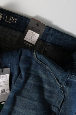 Pánske džínsy  G-Star Raw, Veľkosť M, Farba Modrá, Cena  105,15 €