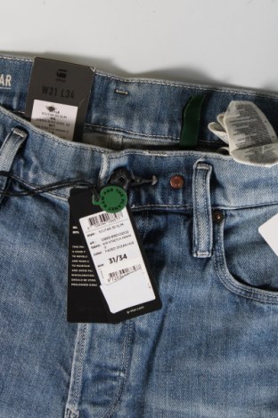 Męskie jeansy G-Star Raw, Rozmiar M, Kolor Niebieski, Cena 543,75 zł