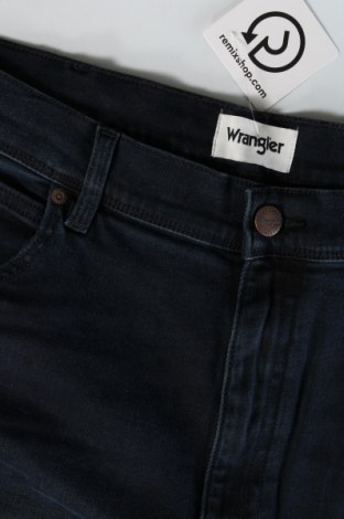 Męskie jeansy Wrangler, Rozmiar XL, Kolor Niebieski, Cena 435,54 zł