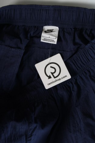 Męskie spodnie Nike, Rozmiar L, Kolor Niebieski, Cena 181,79 zł