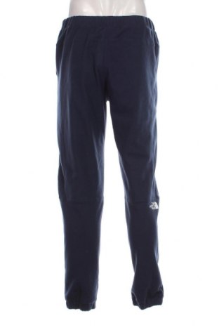 Pantaloni polar de bărbați The North Face, Mărime M, Culoare Albastru, Preț 365,63 Lei