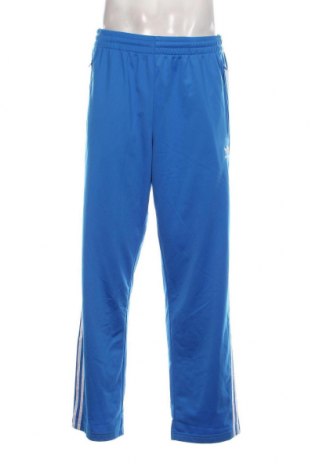 Pantaloni trening de bărbați Adidas, Mărime L, Culoare Albastru, Preț 260,03 Lei