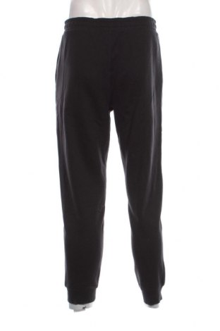 Мъжко спортно долнище Calvin Klein Jeans, Размер M, Цвят Черен, Цена 140,40 лв.
