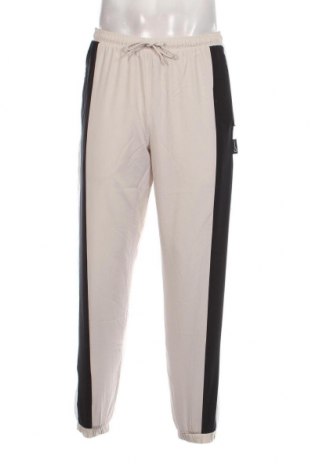 Pantaloni trening de bărbați Nike, Mărime M, Culoare Bej, Preț 290,62 Lei