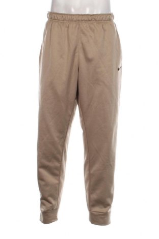 Pantaloni trening de bărbați Nike, Mărime XL, Culoare Bej, Preț 229,44 Lei