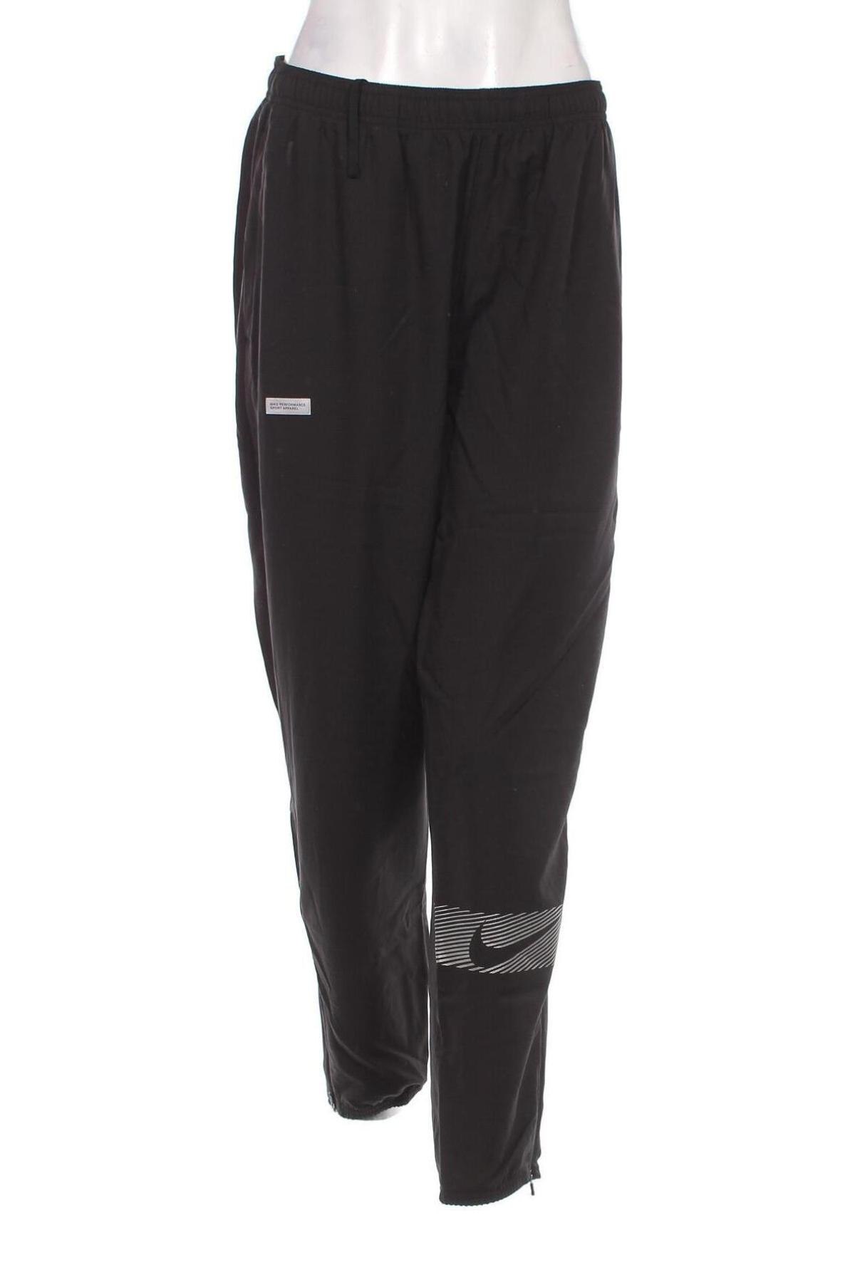 Pantaloni trening de femei Nike, Mărime L, Culoare Negru, Preț 152,96 Lei