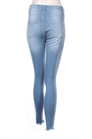 Damskie jeansy Fashion nova, Rozmiar S, Kolor Niebieski, Cena 95,99 zł