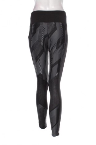 Damskie legginsy Domyos, Rozmiar M, Kolor Kolorowy, Cena 58,43 zł