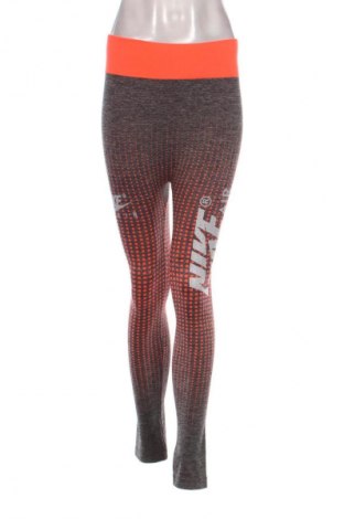 Damskie legginsy Nike, Rozmiar S, Kolor Kolorowy, Cena 111,99 zł