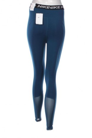 Damskie legginsy Nike, Rozmiar S, Kolor Kolorowy, Cena 252,99 zł