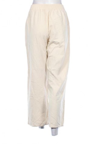 Damskie spodnie Unbranded, Rozmiar M, Kolor Beżowy, Cena 37,99 zł