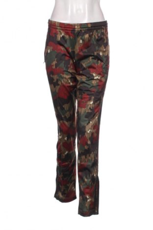 Damskie spodnie sportowe Adidas X Pharrell Williams, Rozmiar L, Kolor Kolorowy, Cena 156,32 zł
