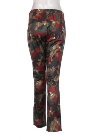 Damskie spodnie sportowe Adidas X Pharrell Williams, Rozmiar L, Kolor Kolorowy, Cena 156,32 zł