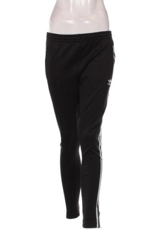 Damskie spodnie sportowe Adidas, Rozmiar M, Kolor Czarny, Cena 134,99 zł
