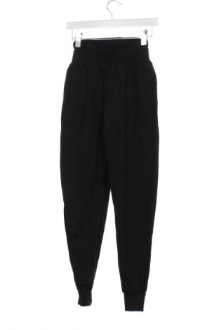 Damskie spodnie sportowe Guess, Rozmiar XS, Kolor Czarny, Cena 382,18 zł