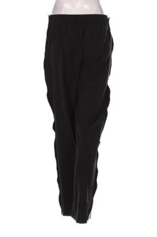 Dámske tepláky Nike, Veľkosť M, Farba Čierna, Cena  23,95 €