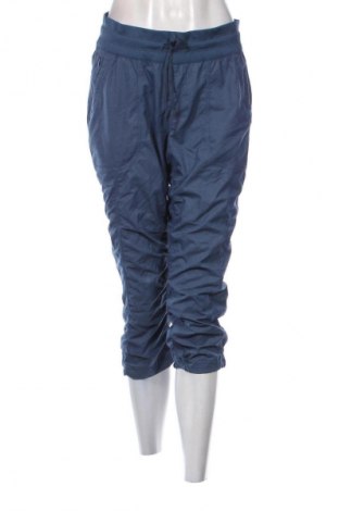 Γυναικείο αθλητικό παντελόνι The North Face, Μέγεθος M, Χρώμα Μπλέ, Τιμή 43,99 €