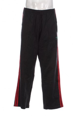 Męskie spodnie sportowe Adidas Originals, Rozmiar L, Kolor Czarny, Cena 355,99 zł