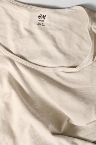 Damen Shirt H&M Sport, Größe L, Farbe Beige, Preis 6,61 €