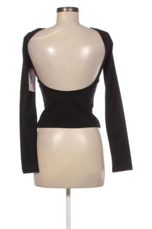 Γυναικεία μπλούζα Nelly, Μέγεθος S, Χρώμα Μαύρο, Τιμή 19,85 €