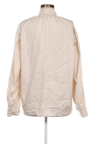 Дамска блуза Uniqlo, Размер M, Цвят Бежов, Цена 20,36 лв.