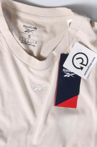 Γυναικείο t-shirt Reebok, Μέγεθος S, Χρώμα  Μπέζ, Τιμή 15,98 €