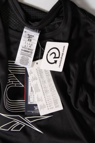 Γυναικείο t-shirt Reebok, Μέγεθος XS, Χρώμα Μαύρο, Τιμή 23,97 €