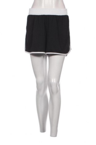 Γυναικείο κοντό παντελόνι Champion, Μέγεθος XL, Χρώμα Μαύρο, Τιμή 6,18 €