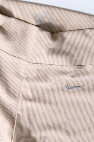 Γυναικείο κολάν Nike, Μέγεθος M, Χρώμα  Μπέζ, Τιμή 19,98 €