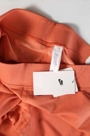 Γυναικείο κολάν Nike, Μέγεθος M, Χρώμα Πορτοκαλί, Τιμή 21,83 €