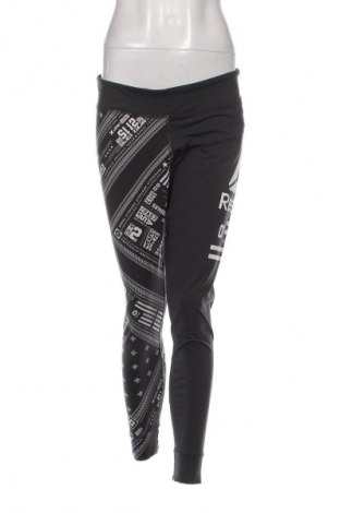 Damskie legginsy Reebok, Rozmiar L, Kolor Kolorowy, Cena 31,99 zł