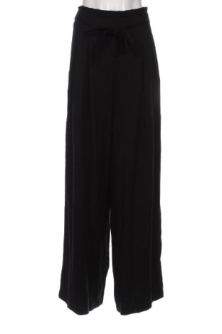 Γυναικείο παντελόνι Guido Maria Kretschmer for About You, Μέγεθος XL, Χρώμα Μαύρο, Τιμή 26,37 €