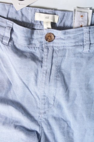 Damskie spodnie H&M, Rozmiar L, Kolor Niebieski, Cena 46,38 zł