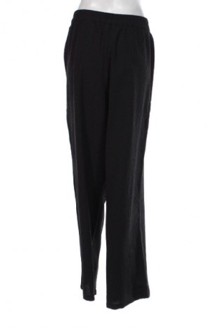 Γυναικείο παντελόνι Monki, Μέγεθος L, Χρώμα Μαύρο, Τιμή 12,99 €
