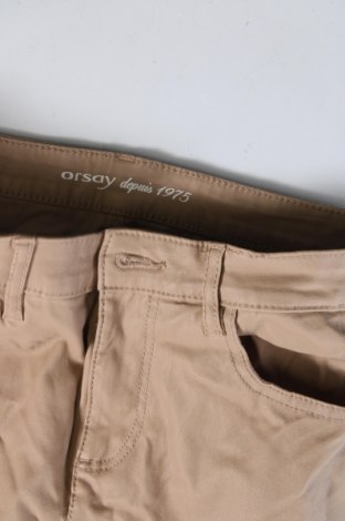 Damskie spodnie Orsay, Rozmiar M, Kolor Beżowy, Cena 37,10 zł