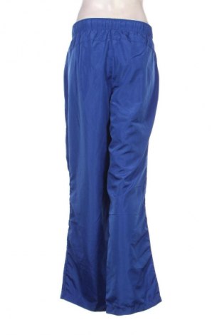 Γυναικείο αθλητικό παντελόνι Crane, Μέγεθος XL, Χρώμα Μπλέ, Τιμή 9,87 €