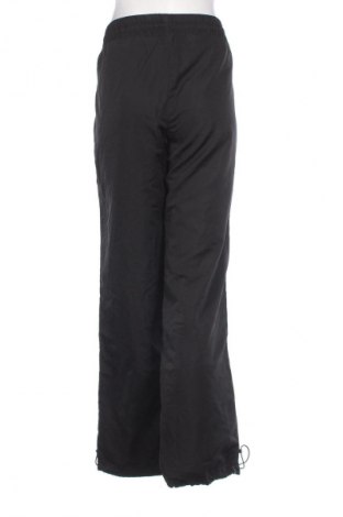 Γυναικείο αθλητικό παντελόνι Crane, Μέγεθος XL, Χρώμα Μαύρο, Τιμή 9,87 €