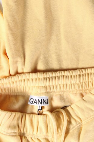Дамско спортно долнище Ganni, Размер XS, Цвят Жълт, Цена 60,67 лв.