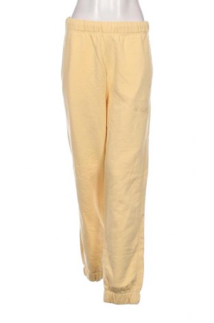 Γυναικείο αθλητικό παντελόνι Ganni, Μέγεθος S, Χρώμα Κίτρινο, Τιμή 17,44 €