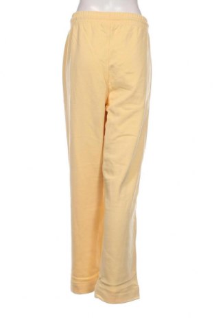 Γυναικείο αθλητικό παντελόνι Ganni, Μέγεθος XL, Χρώμα Κίτρινο, Τιμή 18,28 €