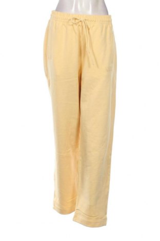 Γυναικείο αθλητικό παντελόνι Ganni, Μέγεθος L, Χρώμα Κίτρινο, Τιμή 16,03 €